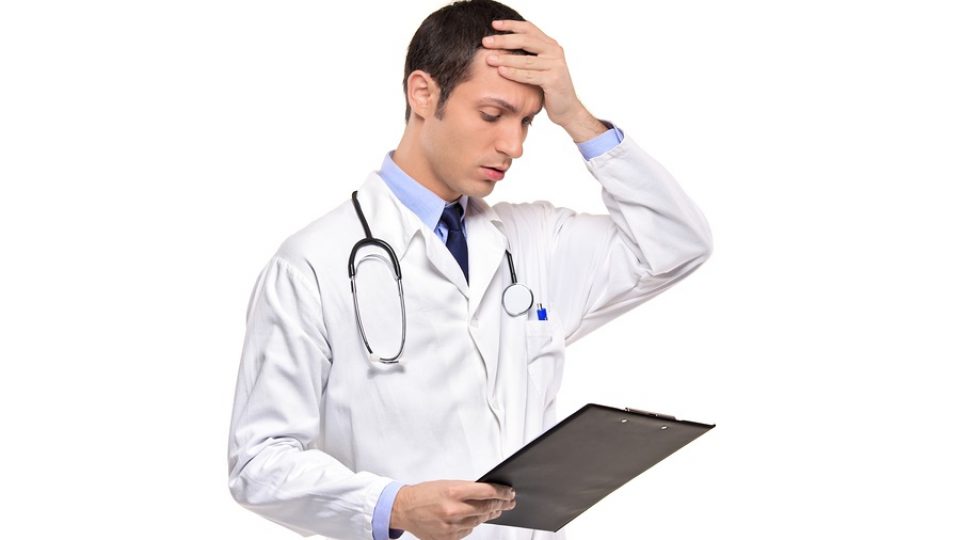 Doctor Banging His Head Realizing A Mistake