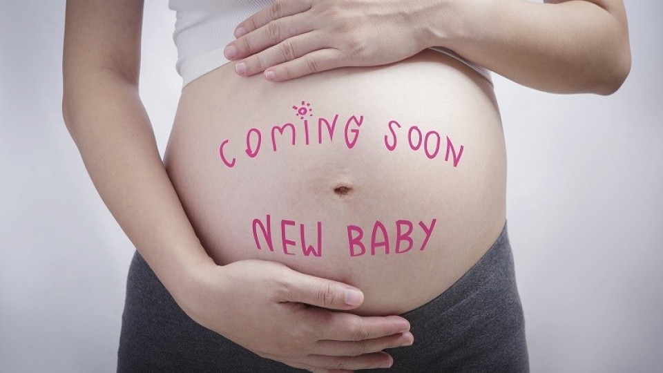 Pregnancy Writing The Word Coming Soon New Baby On Stomach, Preg