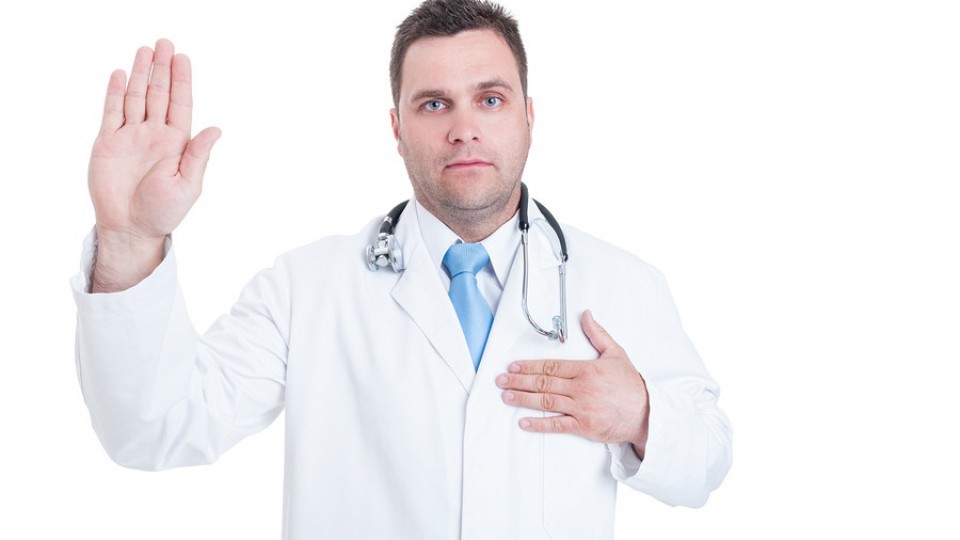 Male Young Doctor Swearing Or Having The Hippocratic Oath