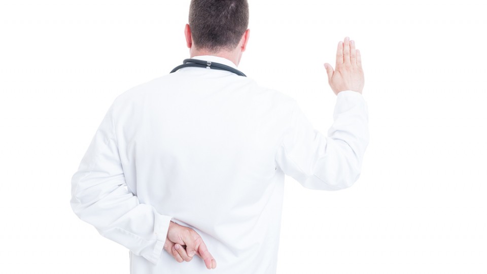 Back View Of Medic Or Doctor Lying About Hippocratic Oath